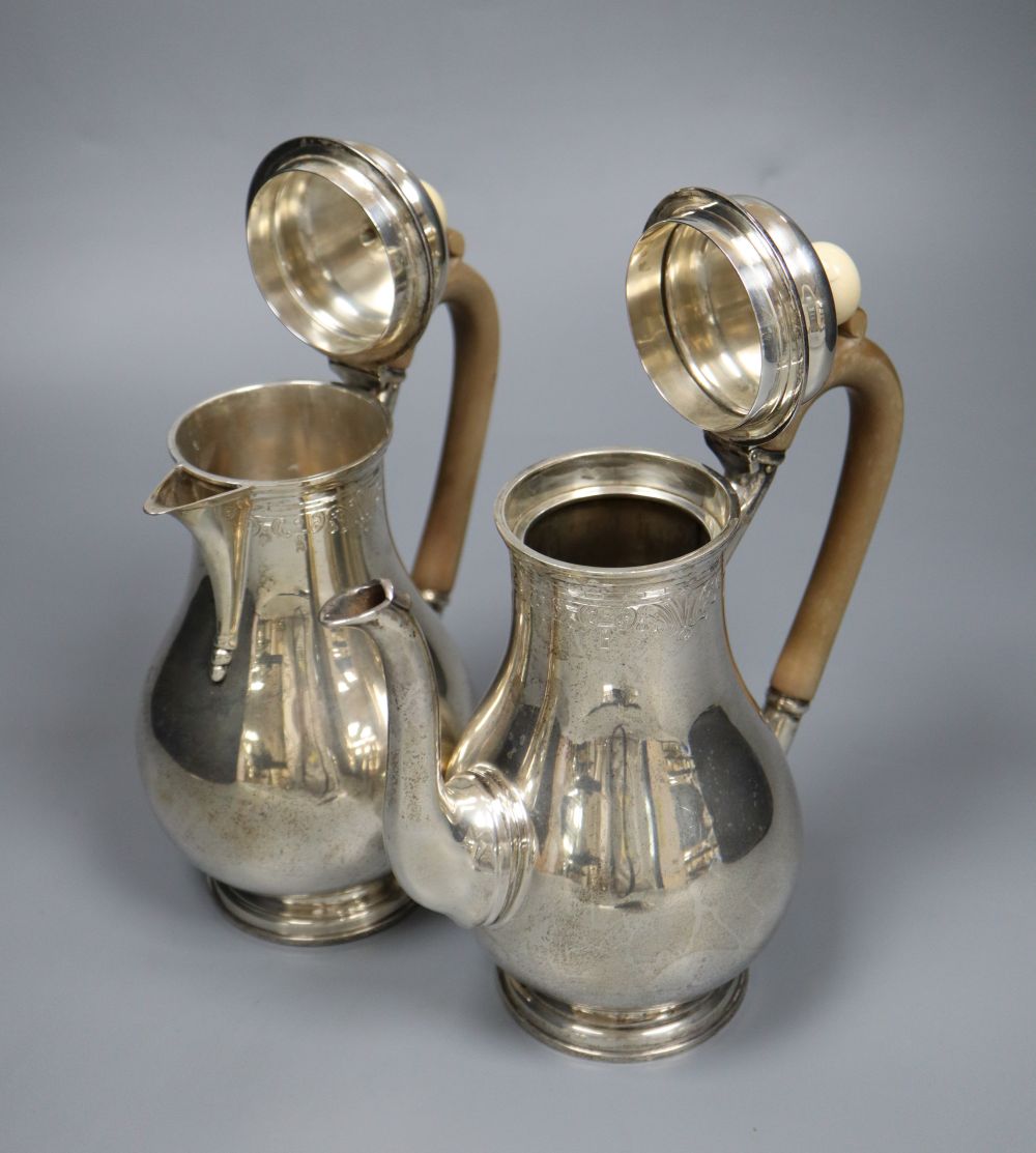 A George V silver cafe au lait pair by S.J. Phillips Ltd, London 1913, 20.5cm, gross 33oz.